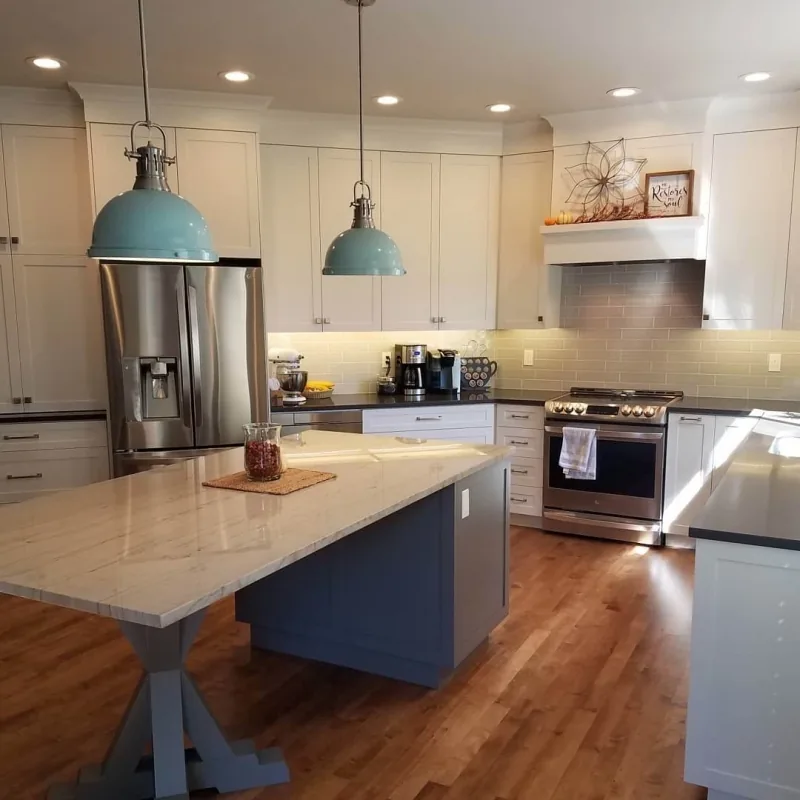 White shaker kitchen remodel in Southeast Boise with a blue custom island