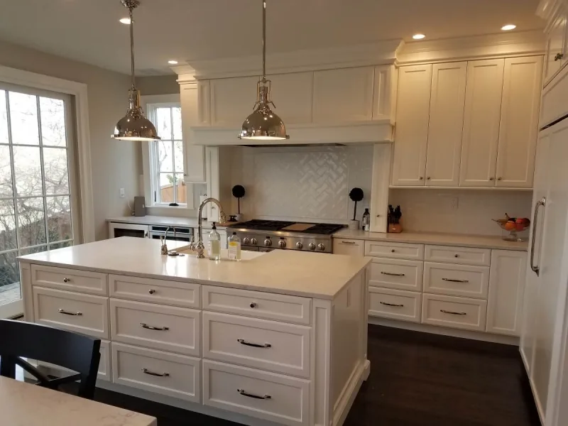 White custom kitchen with island seating, built and installed by Boise Kitchen Cabinets and Design